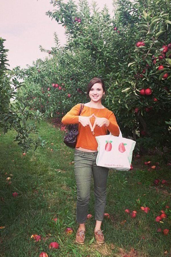 Brenda Suhan on a Kappa Alpha Theta retreat, in an apple orchard.
