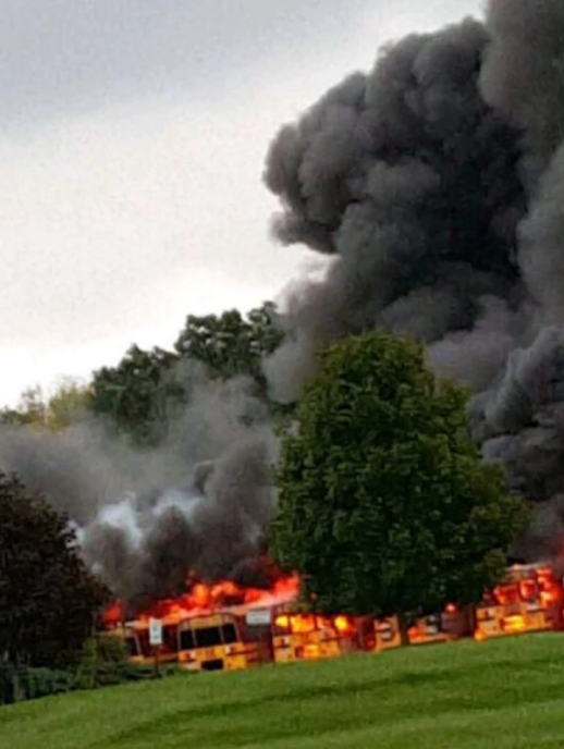 Buses at the North Lake bus depot covered in flames. 
