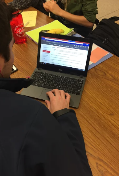 Arrowhead Senior, Tommy Durand, takes the Speak Up survey in Arrowheads North Campus Cafeteria. 