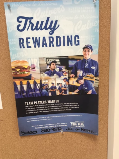 Culvers job applicant sign hangs on a bulletin board in Arrowheads hallways at North Campus.