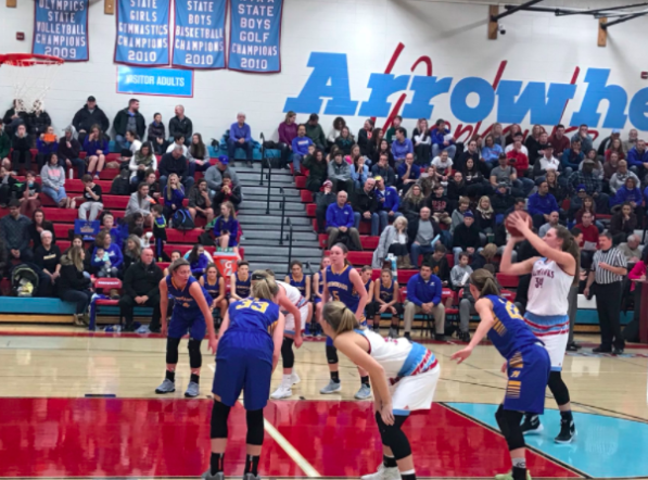 Center Caitlyn Harper shoots free throws late into the second half.