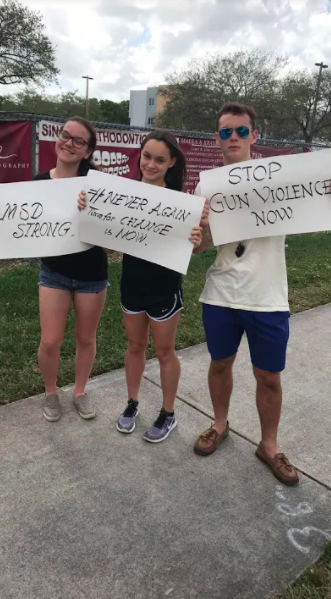 Cooper Brockway and his friends protesting gun rights in Florida (photo taken by friend of Brockway).